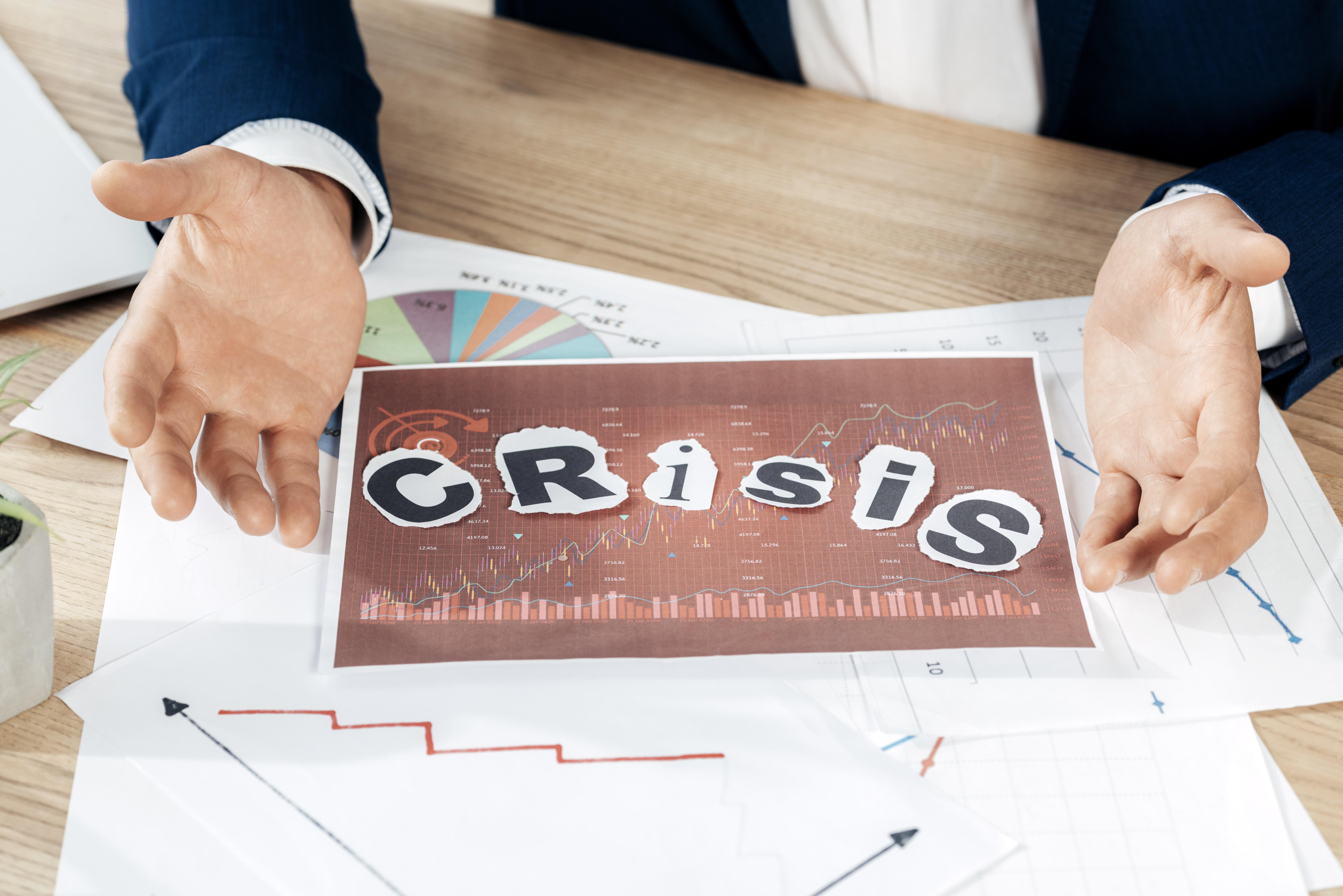 close-up-hands-showing-statistics